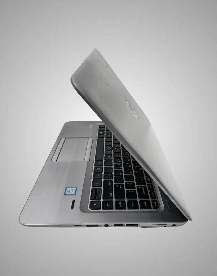 HP EliteBook 840 G3 with a 14-inch Display, Intel Core i5-6200U Processor, 8GB RAM, 256GB SSD, and Integrated Graphics - NomTech